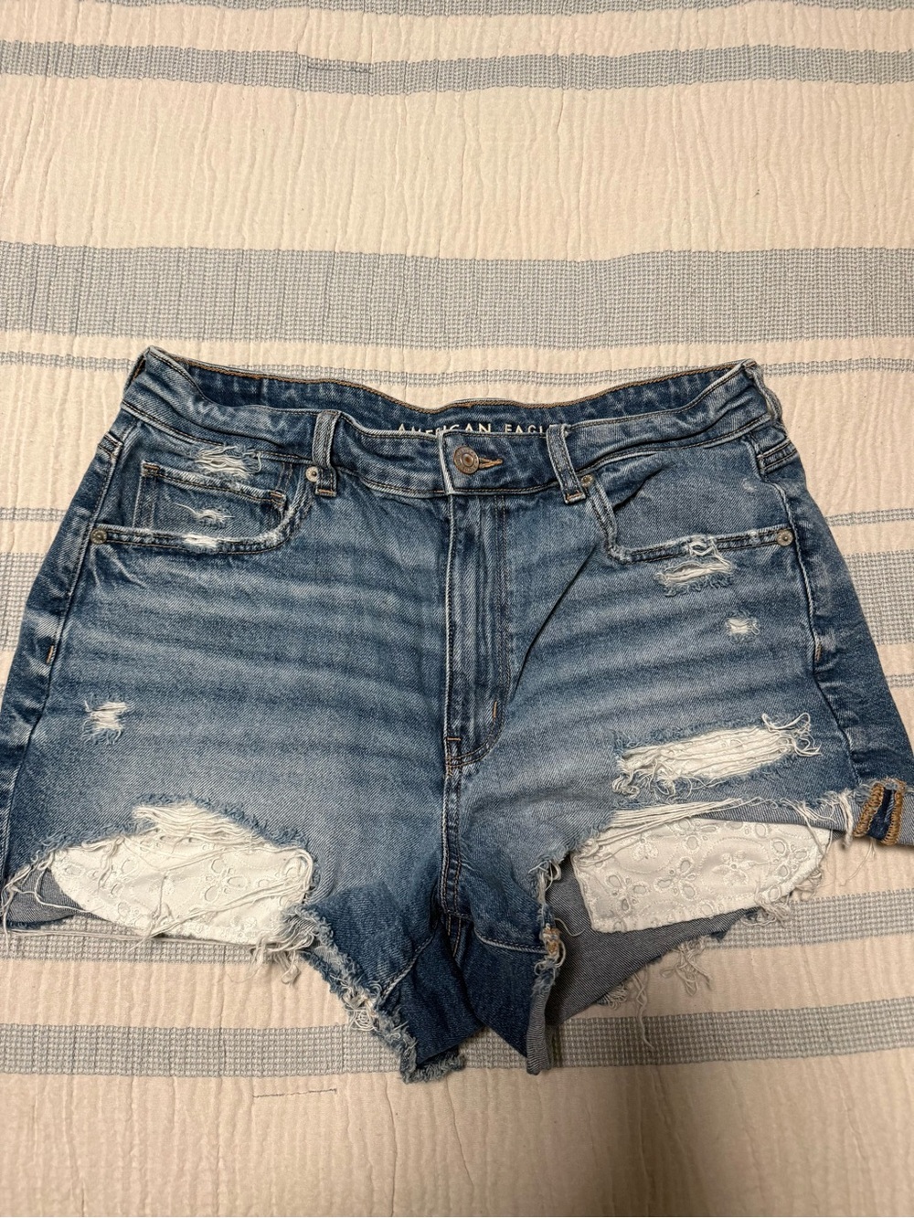 American Eagle Outfitters Distressed Eyelet-Underlay Denim Shorts in Blue